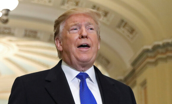 U.S. President Donald Trump talks with reporters next to Senate Majority Leader Mitch McConnell (R-KY) and Senator Roy Blunt (R-MO) as he arrives for a closed Senate Republican policy lunch on Capitol Hill in Washington, U.S., March 26, 2019. REUTERS/Brendan McDermid TPX IMAGES OF THE DAY